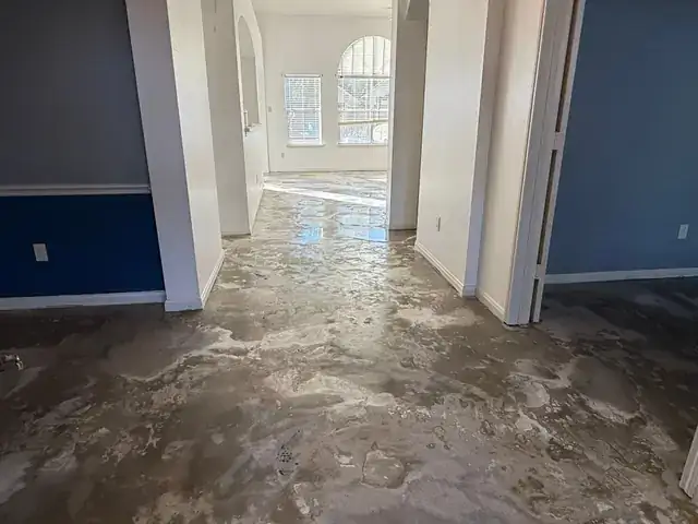 Bare concrete subfloor before new flooring is installed